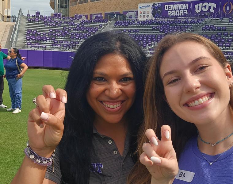 Admission counselor Nicole pictured with international student during Football 101