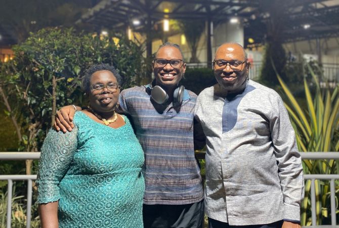 Happy Herman pictured with his parents