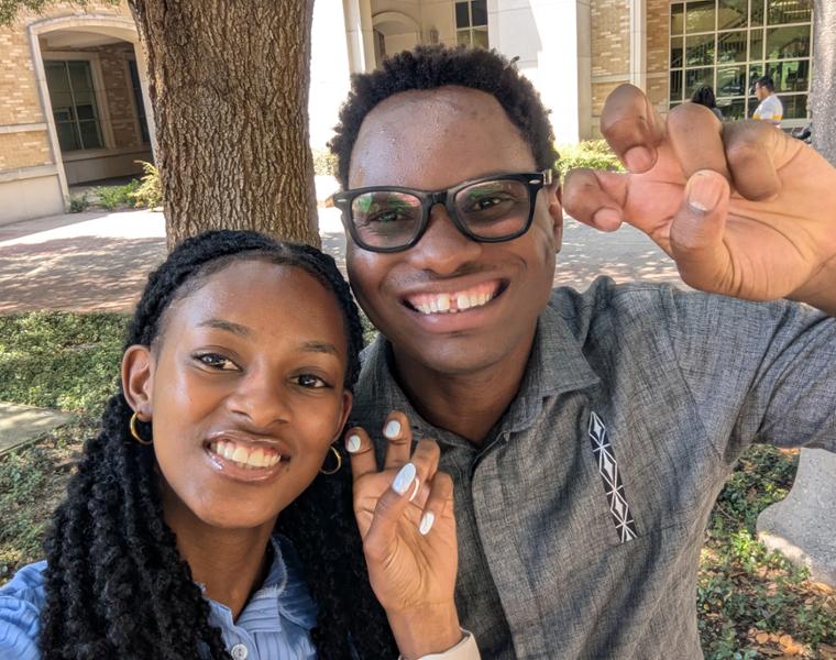 Happy Herman poses with new international student Vanessa who is from his hometown in Rwanda.