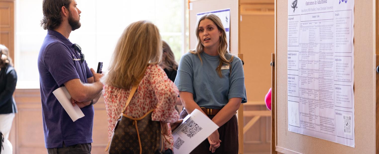 Students presenting research at showcase