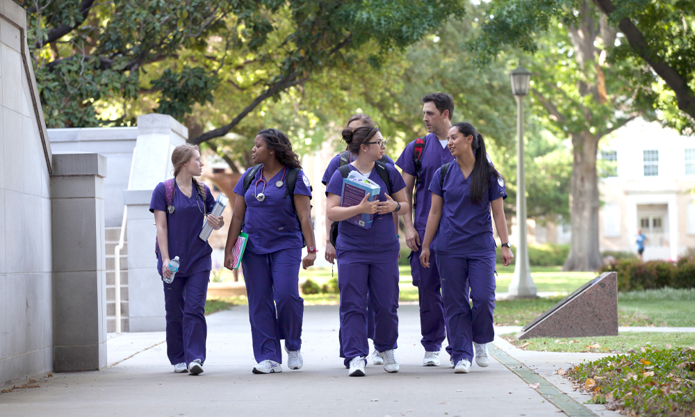 nursing students walking on campus