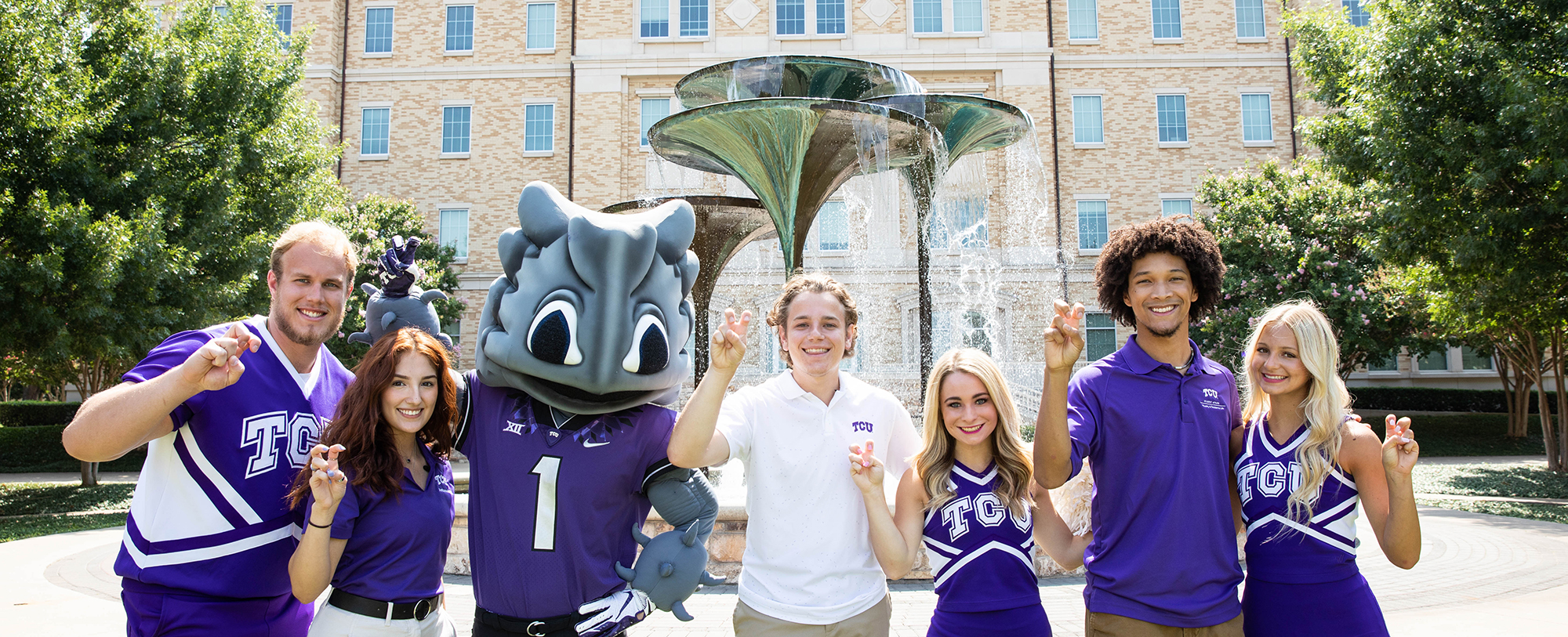 TCU students, Cheer and SuperFrog at Frog Fountain