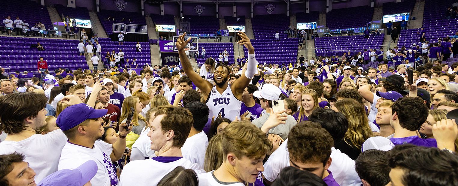 Students celebrating TCU basketball win