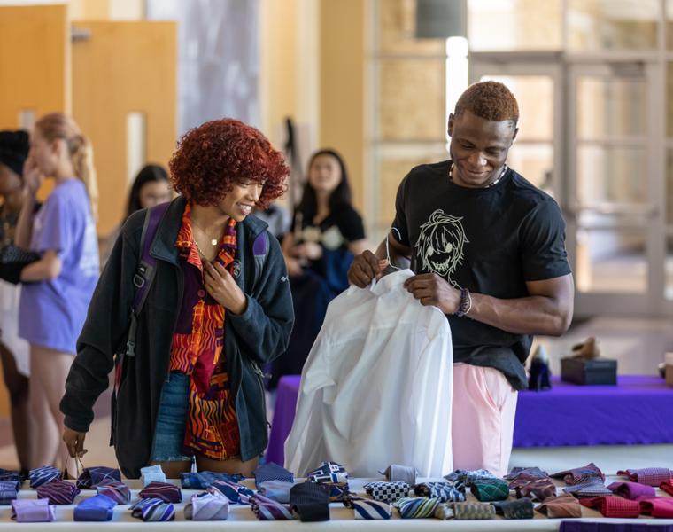 In conjunction with the College of Education, TRiO and Student Support Services provide business attire to students at a Pop-Up shop inside the BLUU Auditorium. Photo by James Anger on September 12, 2022